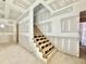 Staircase featuring unfinished wood steps and bright lighting at 3817 Coach Lantern Ave, Wake Forest, NC 27587