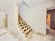 A stairway under construction shows exposed framing, leading to the next level, with drywall partially installed in the home at 3817 Coach Lantern Ave, Wake Forest, NC 27587