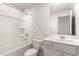 Bathroom with a shower-tub combo, toilet, and vanity with mirror at 385 Dasu Dr, Clayton, NC 27520