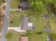 Aerial view highlighting the property's mature landscaping and proximity to other residences at 3913 Vesta Dr, Raleigh, NC 27603
