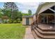 A brick path leads to a backyard storage shed and a covered deck on the rear of the home at 3913 Vesta Dr, Raleigh, NC 27603