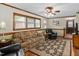 Inviting living room with wood accents, a plush sofa, and a decorative rug creating a warm space at 3913 Vesta Dr, Raleigh, NC 27603