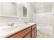 Bathroom featuring a double sink vanity and a combined shower and tub at 3917 White Kestrel Dr, Raleigh, NC 27616