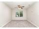 Spacious bedroom with neutral carpet and ample natural light from the window at 3917 White Kestrel Dr, Raleigh, NC 27616
