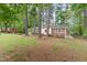 Charming single-story home with brick accents and a well-maintained front lawn at 408 Madison Ave, Cary, NC 27513