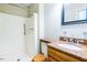 Bathroom featuring a stand-up shower, granite countertops, and a stylish sink at 416 Colony Woods Dr, Chapel Hill, NC 27517