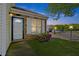 Inviting front entrance with brick and well maintained lawn and mature landscaping at 42 Riverwalk Ter, Durham, NC 27704