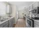 Modern kitchen featuring stainless steel appliances and views of the breakfast nook at 42 Riverwalk Ter, Durham, NC 27704