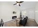 Inviting living room has vaulted ceilings, fireplace, and stylish furnishings, perfect for relaxation at 42 Riverwalk Ter, Durham, NC 27704