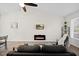 Open living area boasts vaulted ceilings, recessed lights, and an electric fireplace for cozy evenings at 42 Riverwalk Ter, Durham, NC 27704