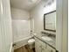 Bathroom showcases a tub/shower combination and a vanity with granite countertops at 427 Earnest Way # L24, Kenly, NC 27542