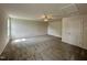 Spacious bonus room with ceiling fan and carpeted floors at 427 Earnest Way # L24, Kenly, NC 27542