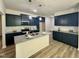 Spacious kitchen with granite countertops, and stainless steel appliances at 427 Earnest Way # L24, Kenly, NC 27542