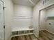 Mud room features built-in bench with storage cubbies and access to the laundry room at 427 Earnest Way # L24, Kenly, NC 27542