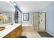 Beautiful primary bathroom with double vanity, large soaking tub, and glass enclosed shower at 429 Gambit Cir, Wake Forest, NC 27587