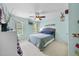 bedroom with light blue walls, natural lighting, a ceiling fan, and decor at 429 Gambit Cir, Wake Forest, NC 27587
