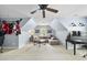 Bright and airy bonus room with ceiling fan, plush carpet, and inviting lounge space at 429 Gambit Cir, Wake Forest, NC 27587