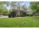 Charming two-story home with brick and siding exterior, featuring a well-maintained lawn and landscaping at 429 Gambit Cir, Wake Forest, NC 27587
