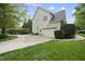 Charming two-story home with attached garage, manicured lawn, and inviting patio area at 429 Gambit Cir, Wake Forest, NC 27587