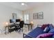 Bright office space with dual monitors, comfortable chair, and day bed for relaxing or guests at 43 Turtle Point Bnd, Chapel Hill, NC 27516