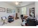 Bright office space with comfortable chair, and several pieces of decorative artwork at 43 Turtle Point Bnd, Chapel Hill, NC 27516