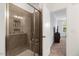 Modern shower room features stylish tile, glass door, and recessed shelves at 433 Wait Ave # 100, Wake Forest, NC 27587