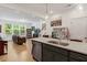 Open-concept living space with seamless flow from kitchen to living area at 433 Wait Ave # 100, Wake Forest, NC 27587