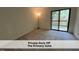 Bright bedroom with a sliding glass door leading to a private deck at 4420 Beechnut Ln, Durham, NC 27707