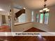 Bright and airy dining room offering a view to the upstairs, making it perfect for Gathering gatherings at 4420 Beechnut Ln, Durham, NC 27707