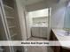 Convenient laundry room with washer and dryer units included at 4420 Beechnut Ln, Durham, NC 27707