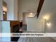 Cozy living room featuring a warm fireplace and an open floor plan for seamless entertaining at 4420 Beechnut Ln, Durham, NC 27707