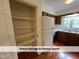 Spacious pantry area with built-in shelving, located conveniently adjacent to the kitchen at 4420 Beechnut Ln, Durham, NC 27707
