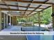 Outdoor patio with picnic tables and seating, perfect for relaxing at 4420 Beechnut Ln, Durham, NC 27707