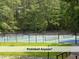 Outdoor pickleball courts with green and blue playing surfaces at 4420 Beechnut Ln, Durham, NC 27707