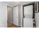 Laundry area features stacked washer/dryer, offering convenience and space saving at 4507 Edwards Mill Rd # F, Raleigh, NC 27612