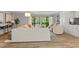 Bright living room with modern decor and sliding glass doors at 4507 Edwards Mill Rd # F, Raleigh, NC 27612