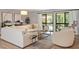 Bright living room with modern decor and sliding glass doors at 4507 Edwards Mill Rd # F, Raleigh, NC 27612