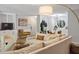 Bright living room featuring modern decor, neutral tones, and comfortable seating arrangements at 4507 Edwards Mill Rd # F, Raleigh, NC 27612