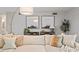 Bright living room with comfortable seating, stylish lighting, and modern decor at 4507 Edwards Mill Rd # F, Raleigh, NC 27612