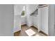 Attic space closet features hardwood floors and custom closet storage at 510 Guy Walker Way, Durham, NC 27703