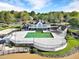 Aerial view of large community pool, clubhouse, and surrounding recreational amenities, enhancing community living at 510 Guy Walker Way, Durham, NC 27703