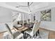 Elegant dining room with hardwood floors, stylish lighting, and seating for six at 510 Guy Walker Way, Durham, NC 27703