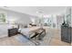 Spacious main bedroom with hardwood floors and seating area at 510 Guy Walker Way, Durham, NC 27703