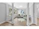 Bright sitting area with large windows, hardwood floors, and decorative columns at 510 Guy Walker Way, Durham, NC 27703