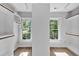 Spacious walk-in closet with custom shelving and bright windows at 510 Guy Walker Way, Durham, NC 27703