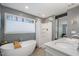 Bright bathroom featuring a double vanity, soaking tub, and a separate shower with a neutral color scheme at 5315 Oakbrook Dr, Durham, NC 27713