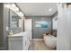 Bathroom with a double vanity, soaking tub, and shower with a neutral color scheme at 5315 Oakbrook Dr, Durham, NC 27713