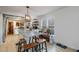 Kitchen island with granite counters, seating and light-filled windows with a view at 5315 Oakbrook Dr, Durham, NC 27713