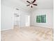 Bright main bedroom with carpet, vaulted ceiling, closet, and ensuite bathroom access at 5504 Cumberland Plain Dr, Raleigh, NC 27616