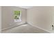 Bedroom with carpet and window at 5801 Forest Point Rd, Raleigh, NC 27610